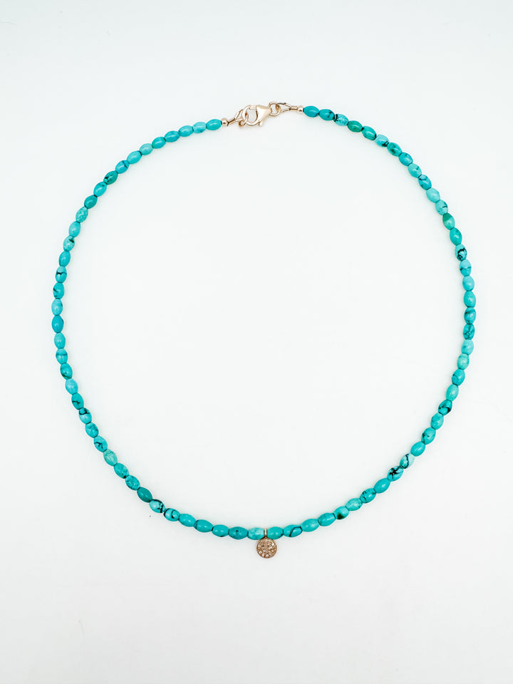 Turquoise Necklace with Gold and Diamond Coin Charm